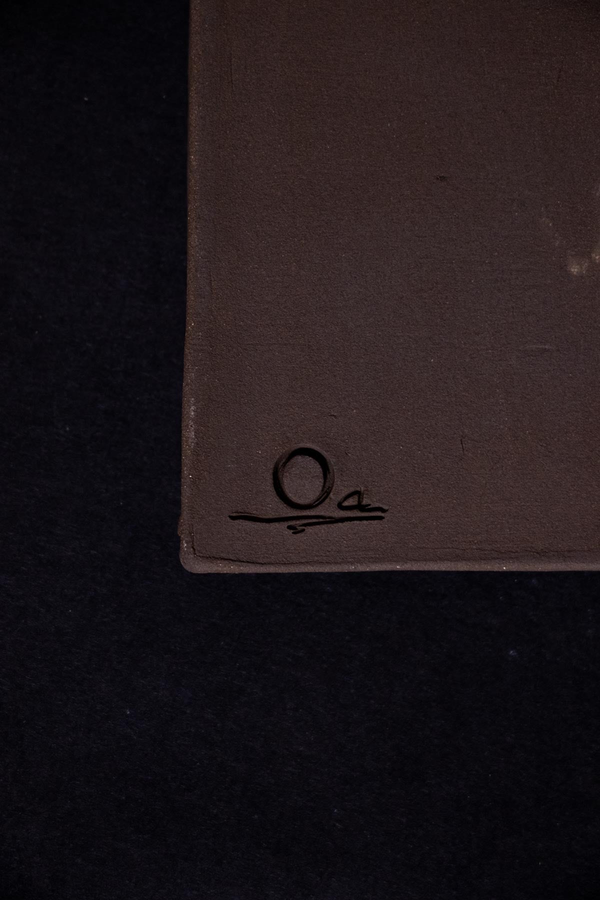 Claire Lune logo detail on a brown rectangular tray. Incense burner detail.