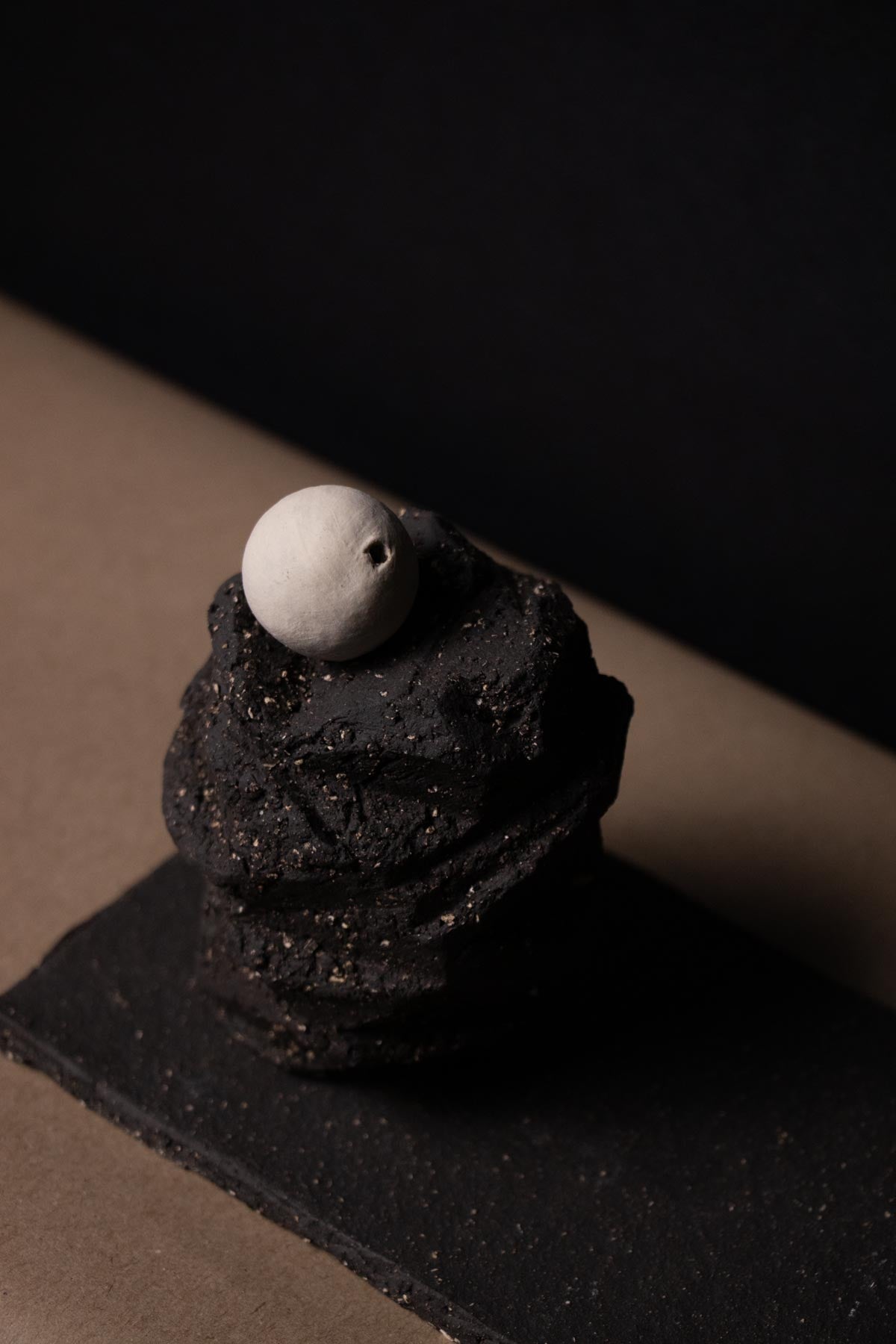 Kurinuki incense burner inspired by the moon. Incense stick in kurinuki incense holder. Ceramic incense holder.