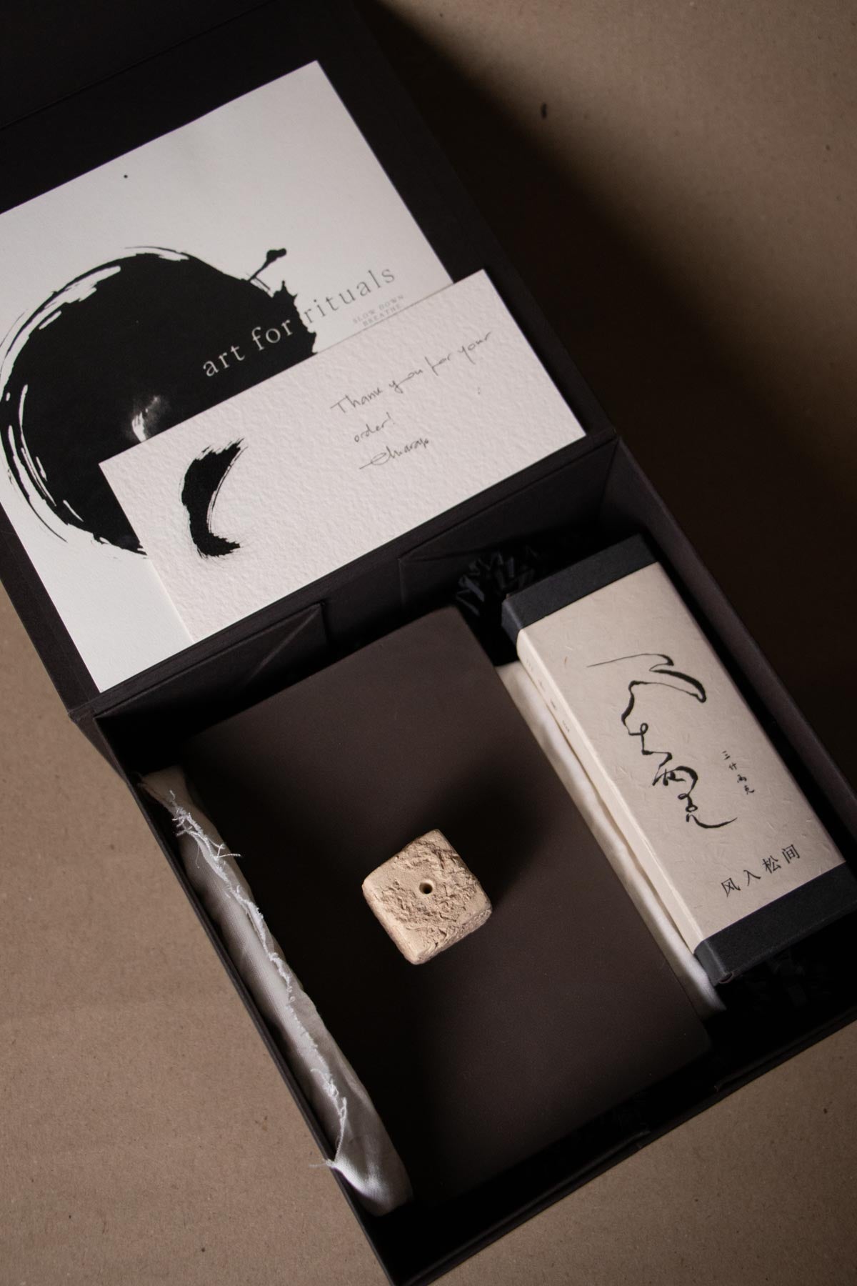 Ritual Kit with ceramic incense holder, a box of Chinese incense sticks. Ink brushstrokes and meditation guide. Ink art. Ink artworks. Sanshiliangke incense.