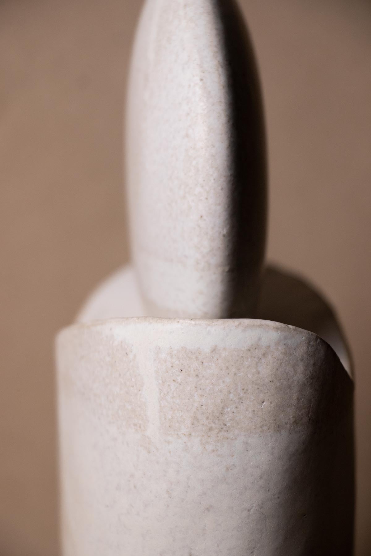 Close-up of white ceramic sculpture. contemporary ceramics. handmade sculpture. Handmade ceramics made in Italy