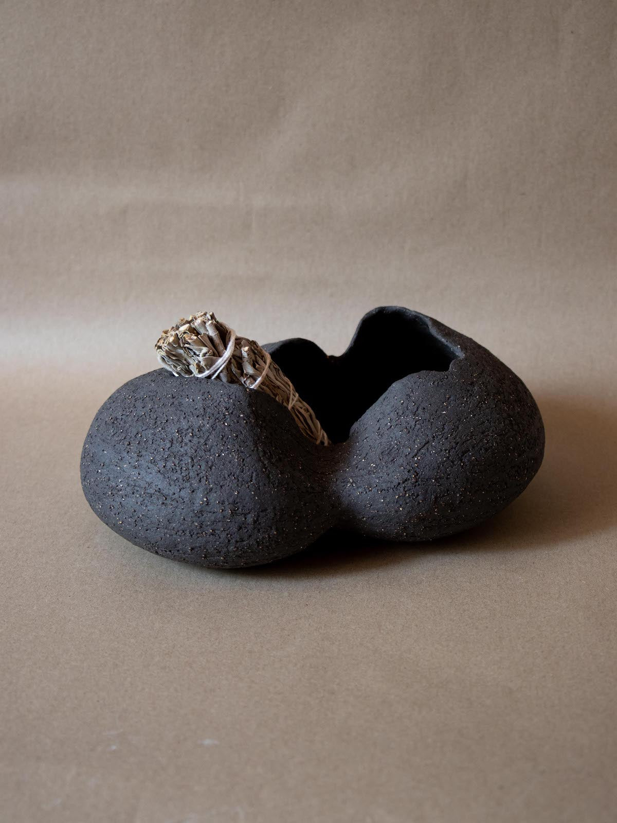 Contemporary black ceramic sculpture. Abstract shape. Table and shelf decor. Functional art. Smudge stick holder.