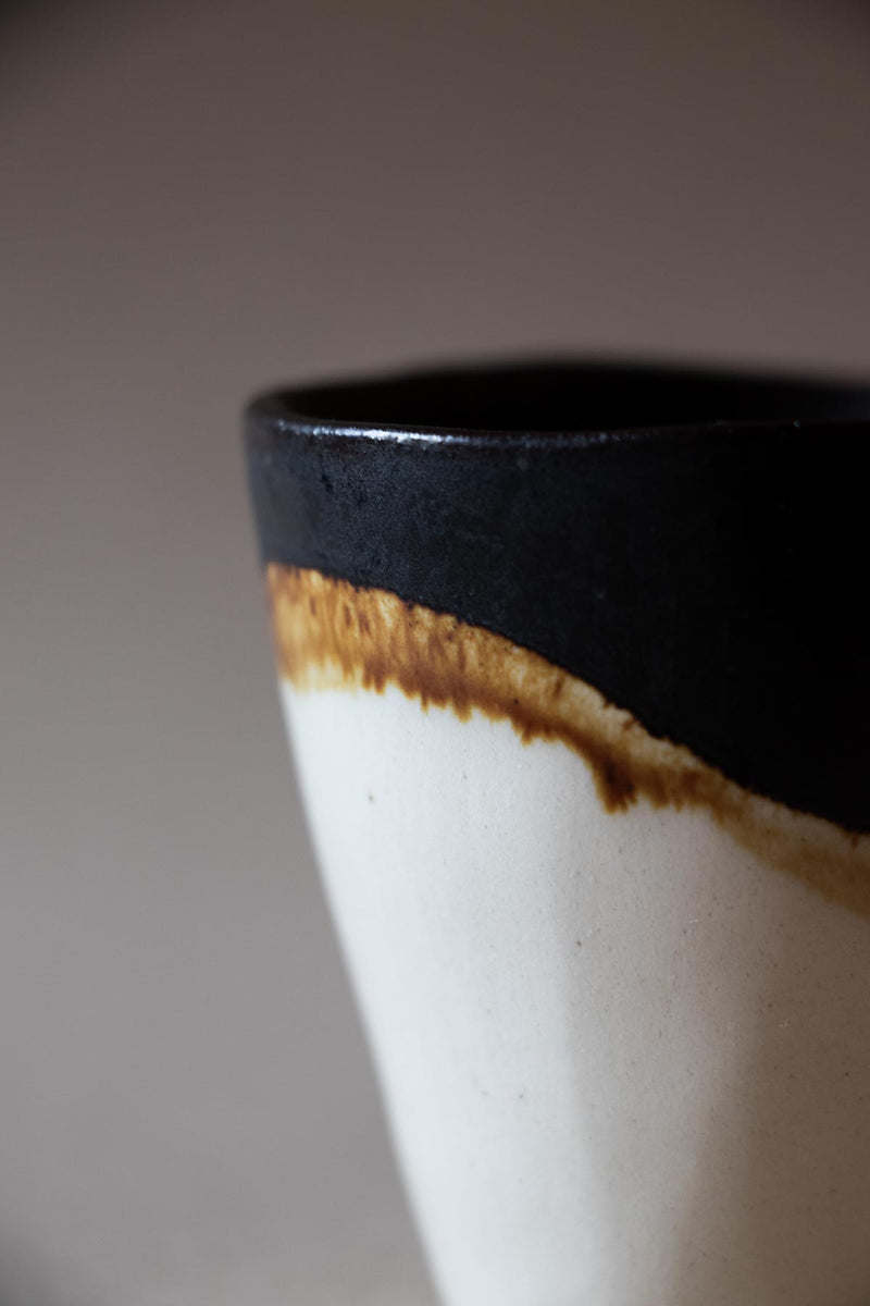 Espresso ceramic cup. Handmade ceramic cups. Black and white ceramic cups. Handmade ceramics by Claire Lune. Half moon ceramic cup.