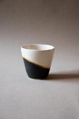 Espresso ceramic cups. Handmade ceramic cups. Black and white ceramic cups. Handmade ceramics by Claire Lune. Half moon ceramic cup.