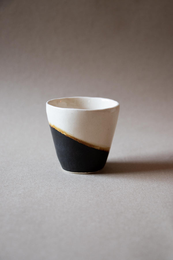 Espresso ceramic cups. Handmade ceramic cups. Black and white ceramic cups. Handmade ceramics by Claire Lune. Half moon ceramic cup.