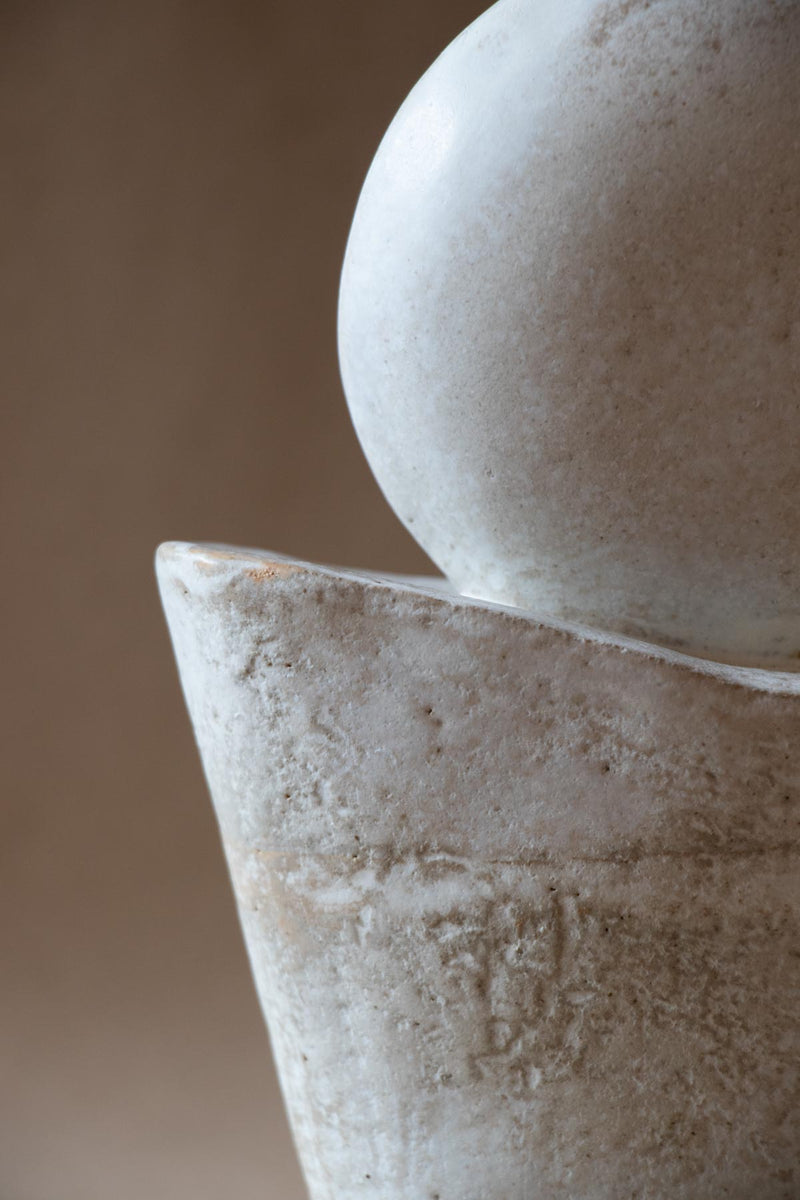 White ceramic sculpture inspired by the Full Moon. Contemporary ceramic sculpture. Yoga studio decor. Full Moon. Handmade ceramics made in Italy. Claire Lune.
