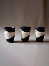 Set of six espresso ceramic cups. Handmade ceramic cups. Black and white ceramic cups set. Handmade ceramics by Claire Lune. Half moon ceramic cup.