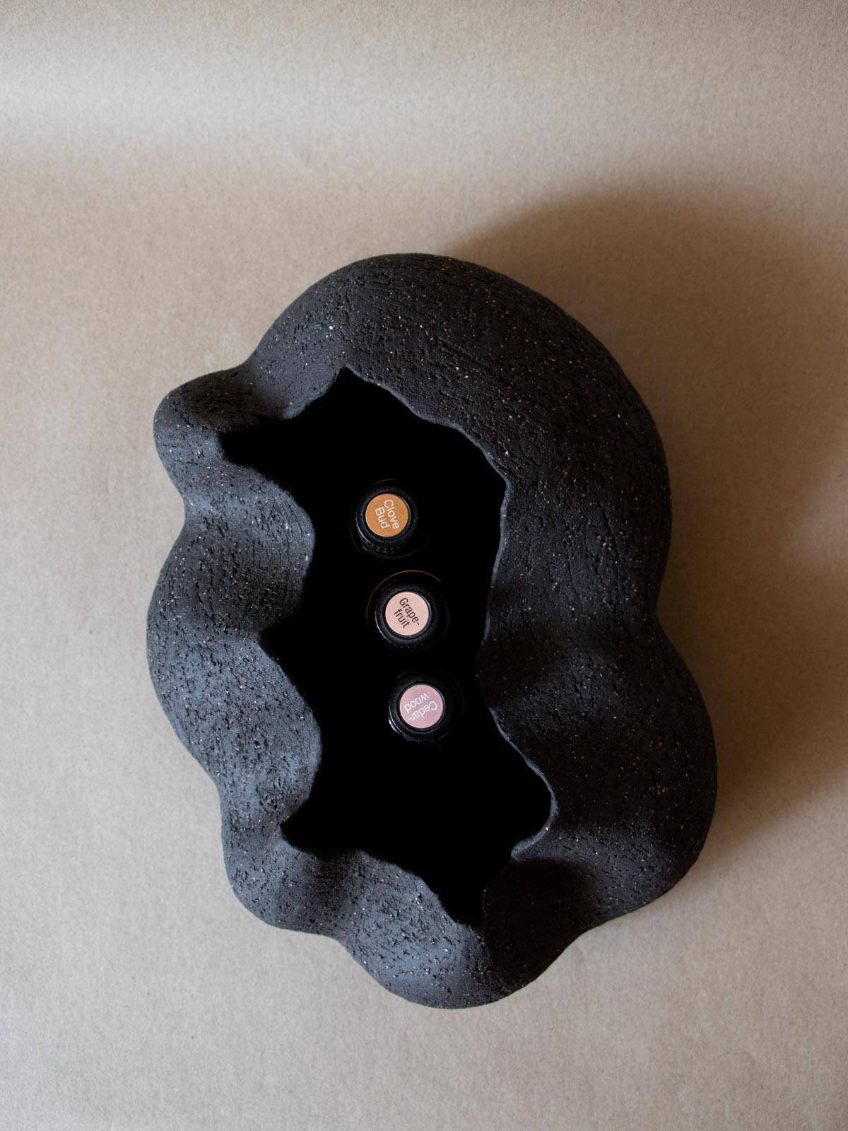 Contemporary black ceramic sculpture. Abstract shape. Table and shelf decor. Functional art. Essential oils holder. Doterra essential oils.Made in Italy. 