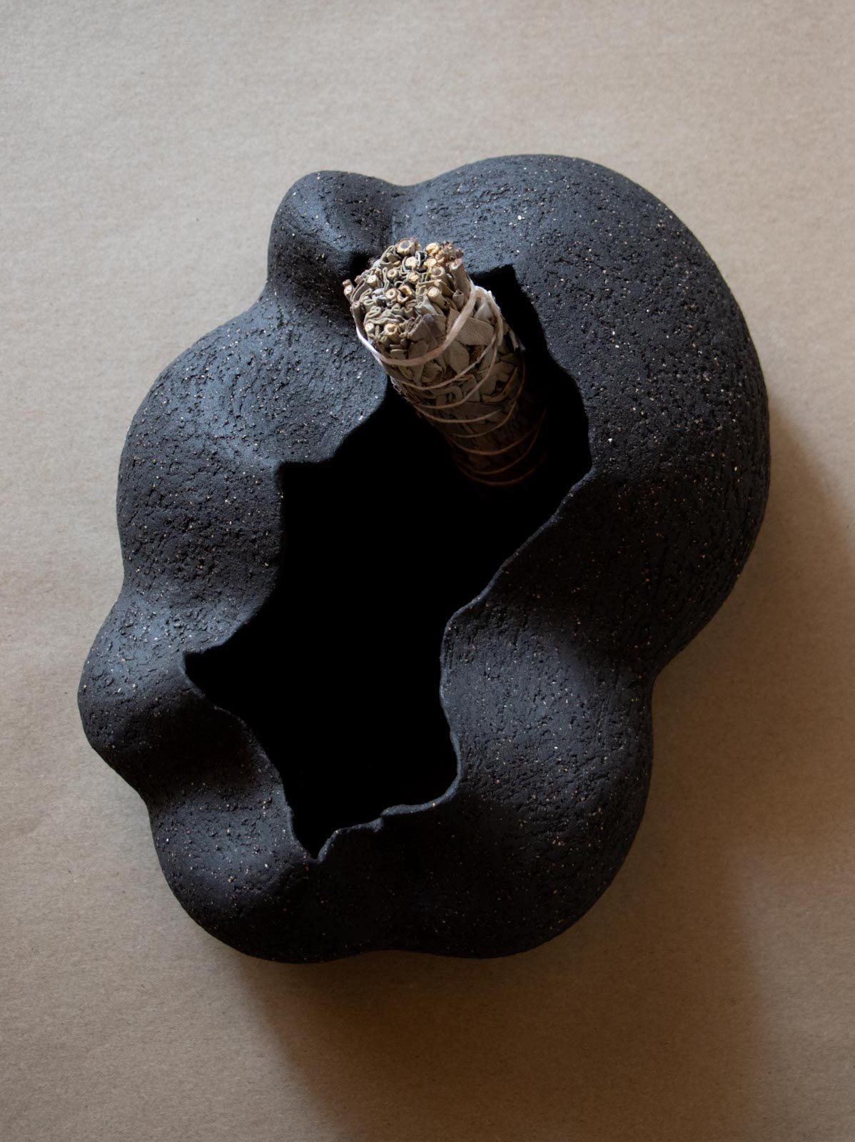 Contemporary black ceramic sculpture. Abstract shape. Table and shelf decor. Functional art. Smudge stick holder. Made in Italy. 