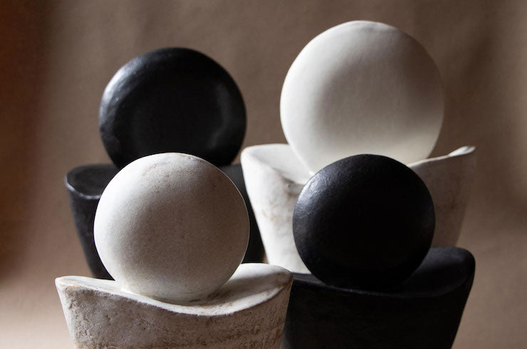 Contemporary ceramic sculptures. Black ceramic sculpture. White ceramic sculptures. Moon sculptures. Modern ceramics. Modern ceramic artist.