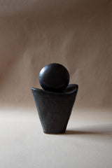 Black ceramic sculpture inspired by the New Moon. New Moon sculpture. Yoga studio decor. Meditation room decor. handmade ceramics by Claire Lune.