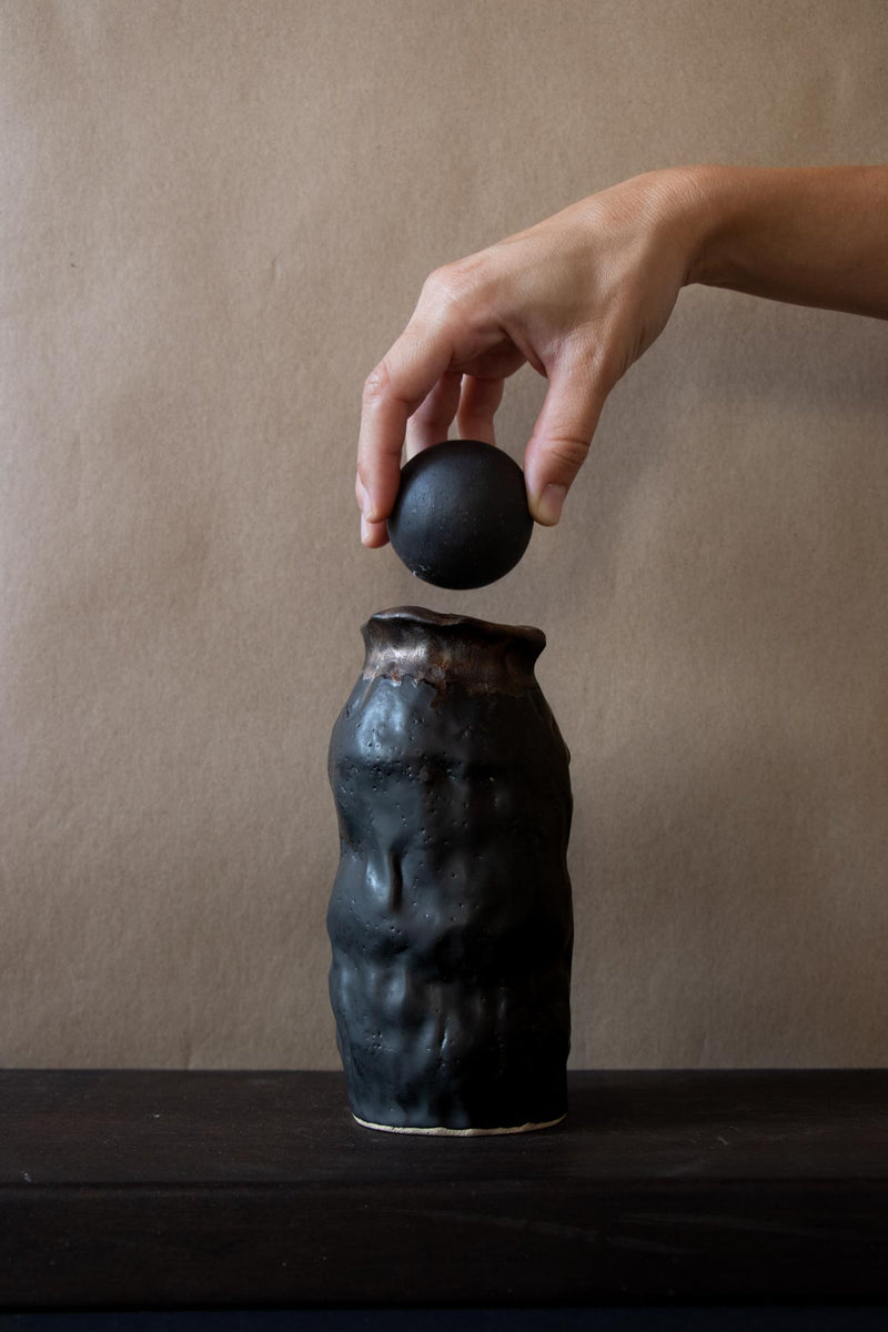 Decorative vase. Black vase. Ceramic vase. Contemporary ceramic vase. Handmade ceramics by Claire Lune. Claire Lune vase. 