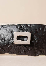 Luxury incense burner. Black incense burner with texture. Handmade ceramic incense burner by Claire Lune. Detail of foot.
