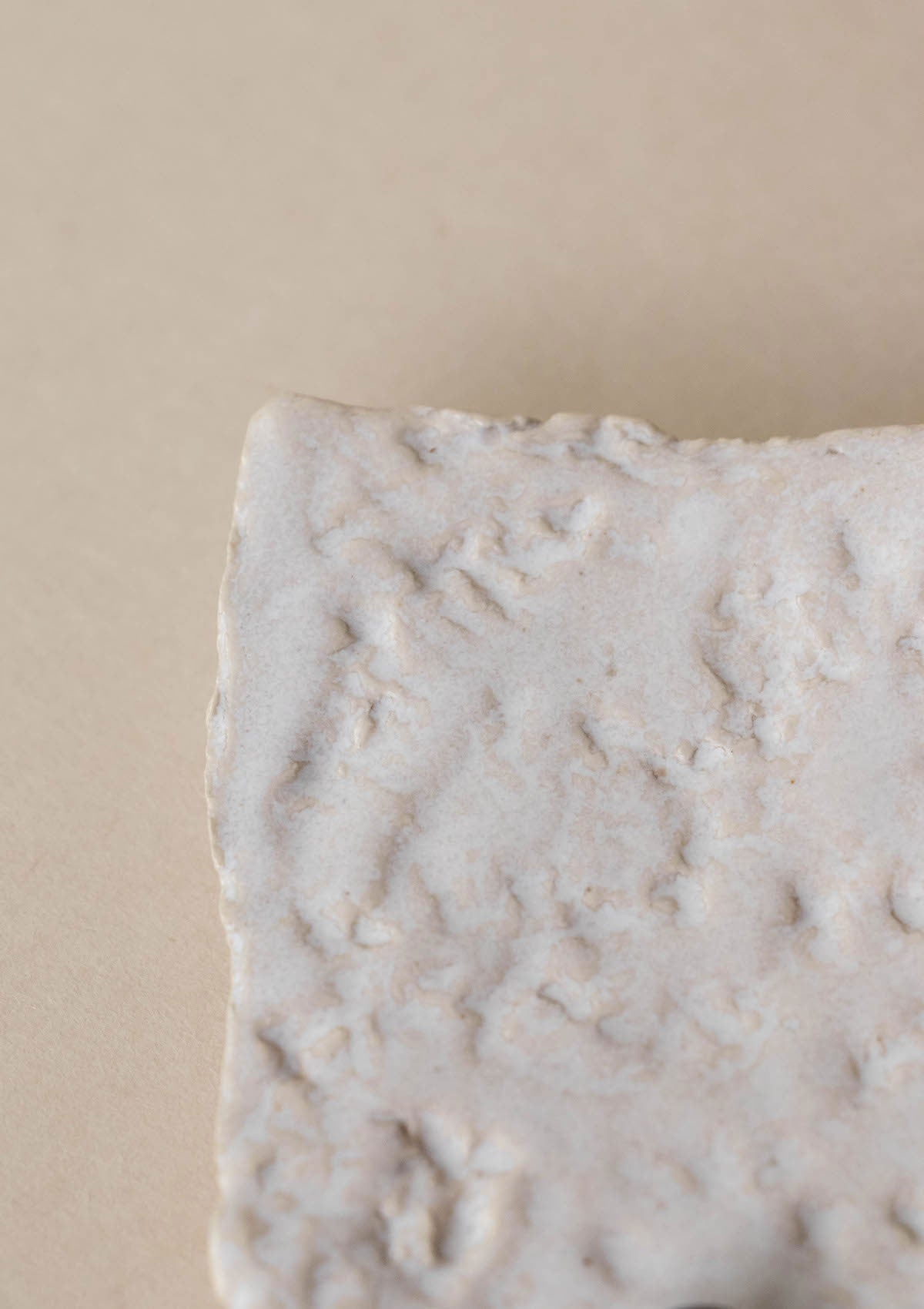 Luxury incense burner. White ceramic incense burner. Detail of texture.